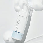 Nettoyant Dokdo Bubble Foam de Round Lab, mousse coréenne douce pour purifier et hydrater la peau.