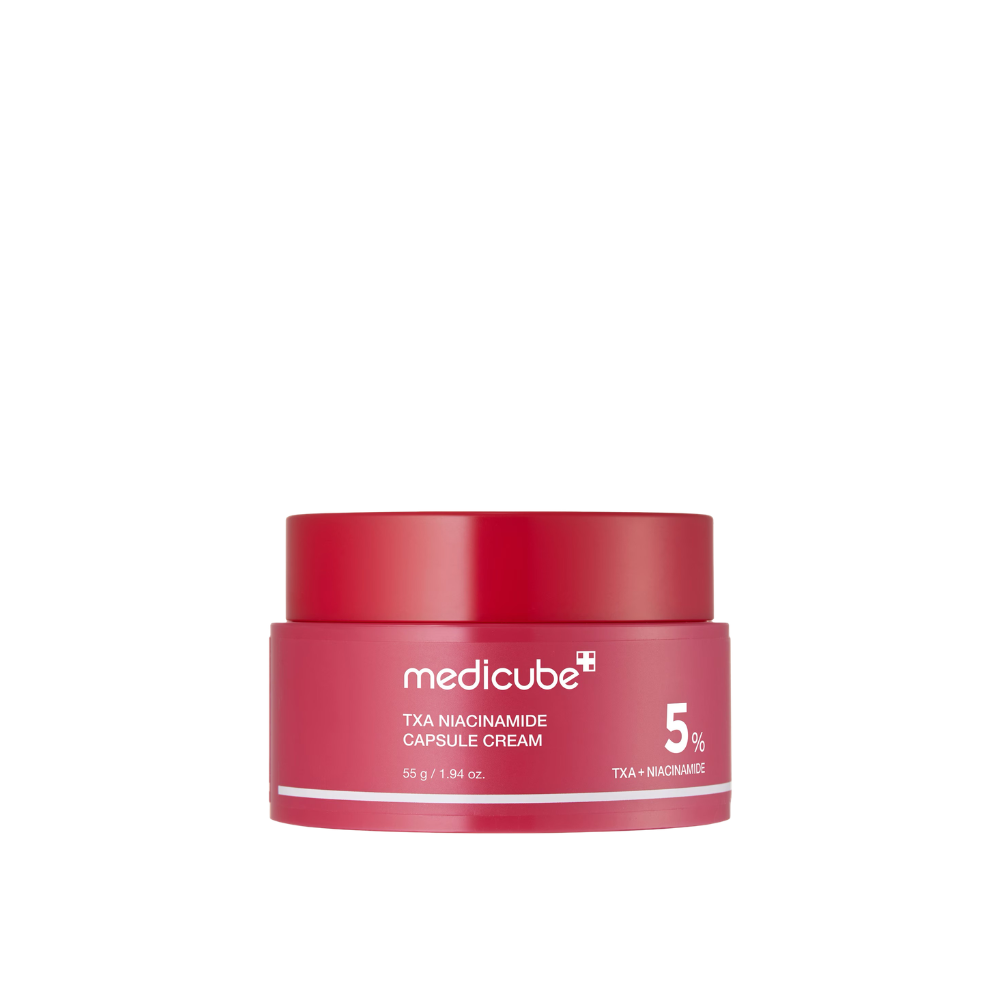 Crème visage anti-taches aux capsules de TXA 99 %, niacinamide 5 %, alpha-arbutine et glutathion.