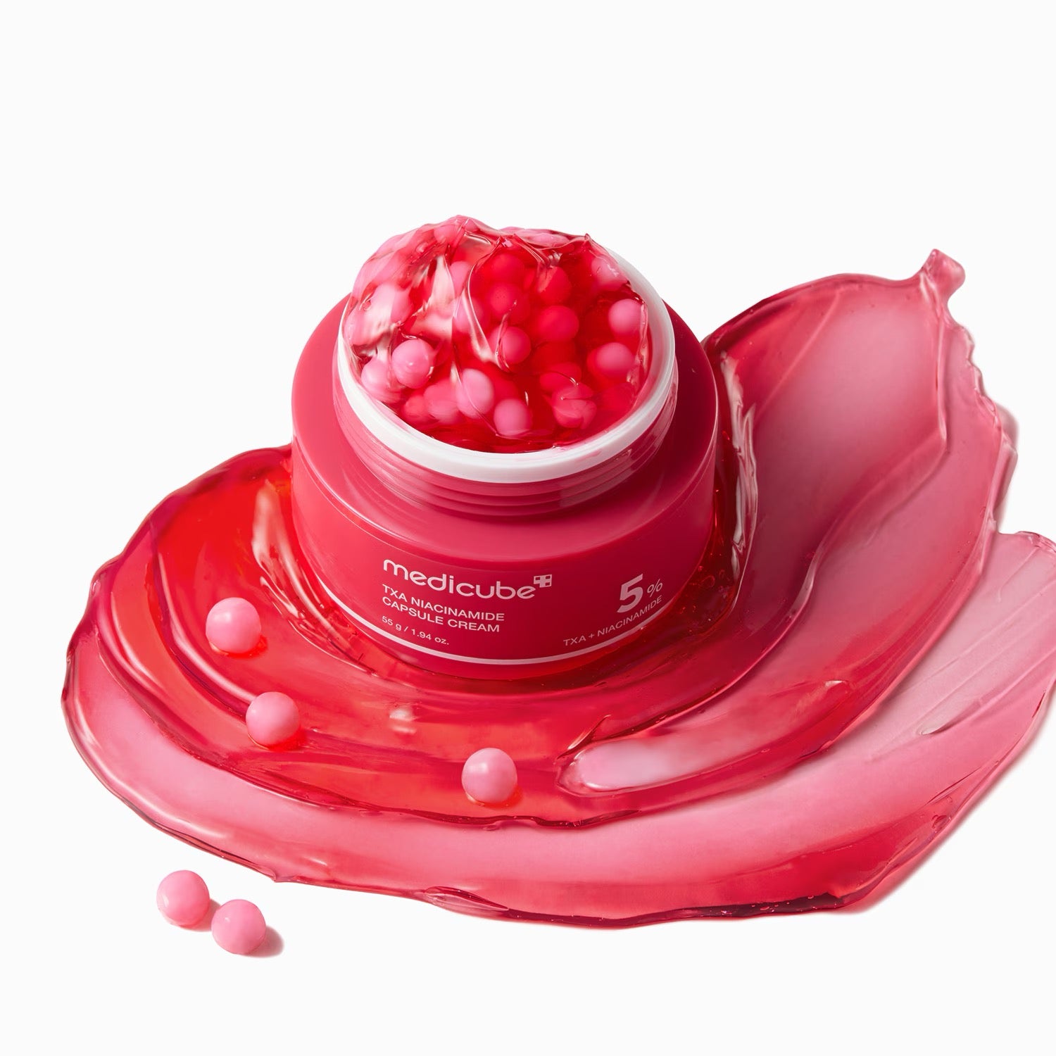 Crème visage anti-taches aux capsules de TXA 99 %, niacinamide 5 %, alpha-arbutine et glutathion.